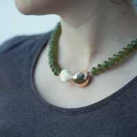 collier met gouden slot en peridoot